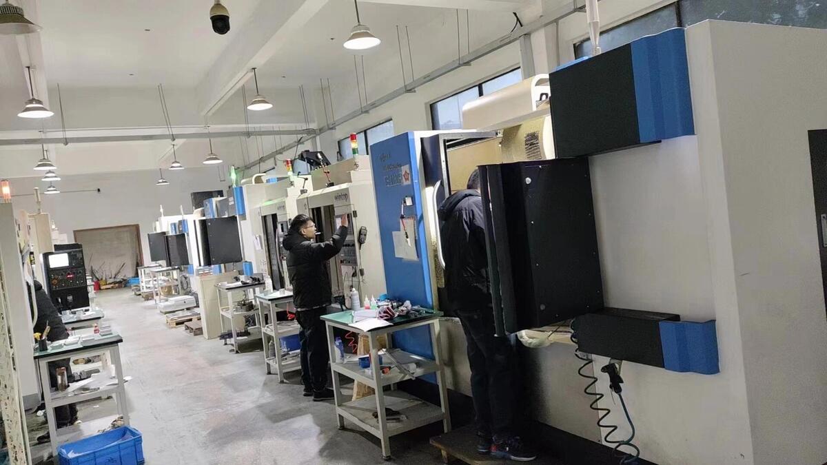 Wide view of the YXT CNC production floor in Dongguan