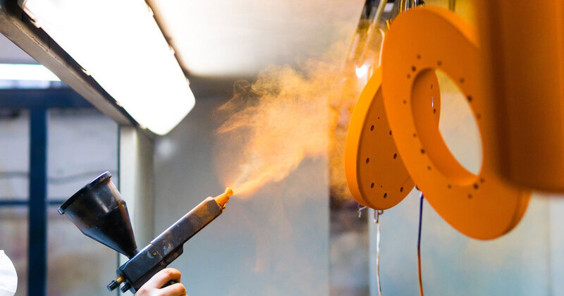 Electrostatic powder coating application on metal components