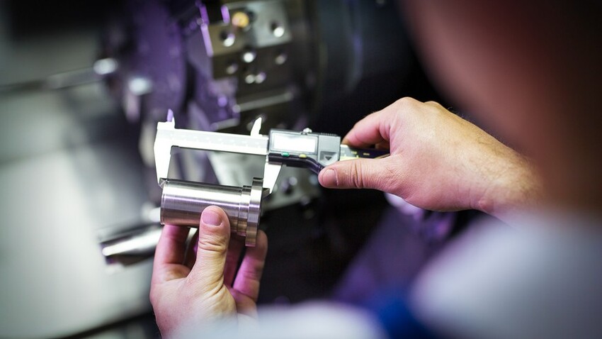 Dimensional inspection of a precision machined component