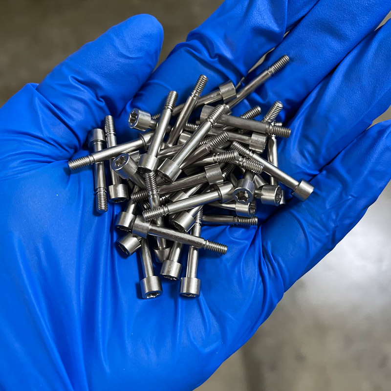 Small Swiss-machined titanium components