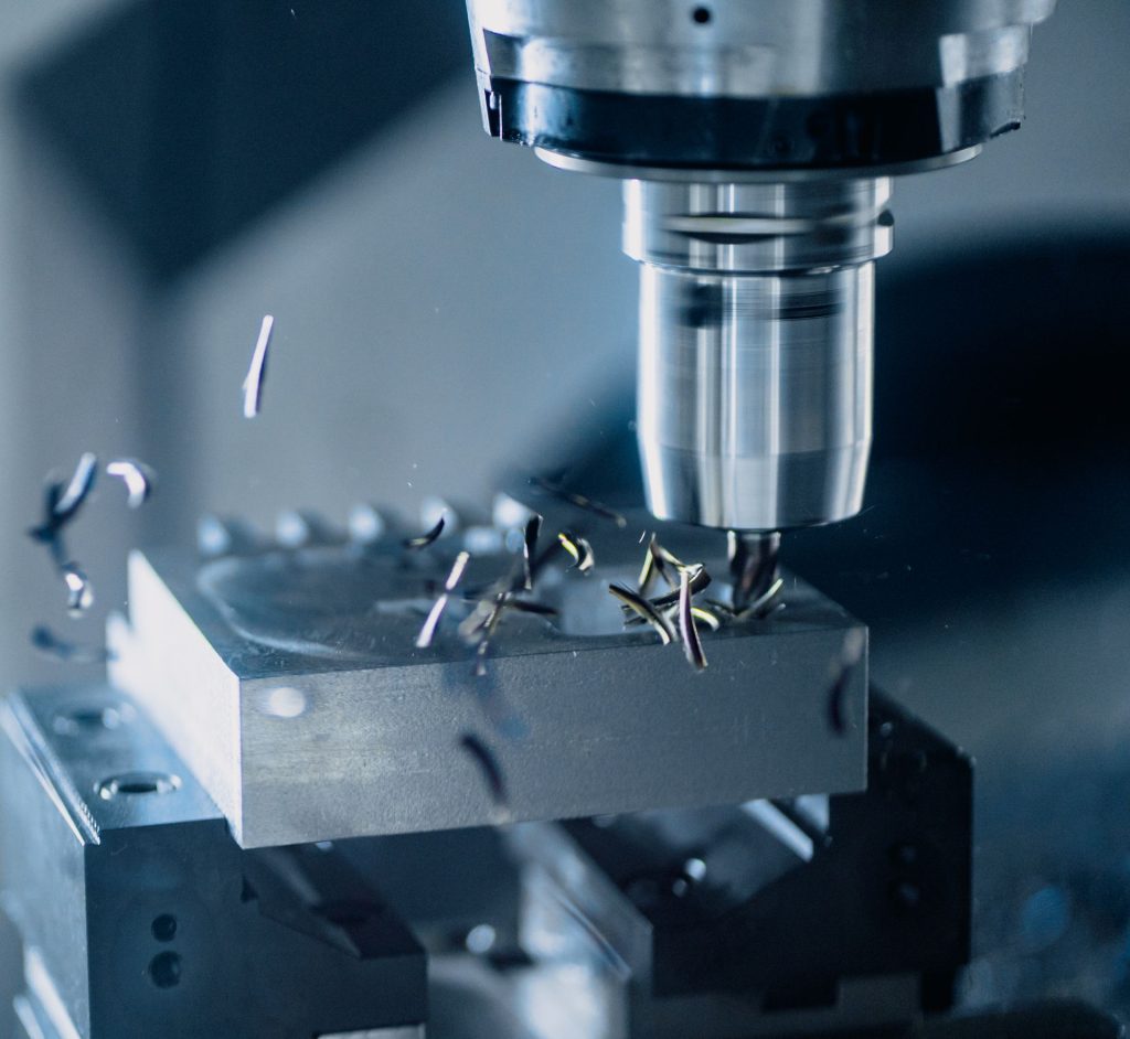 CNC milling machine working on metal