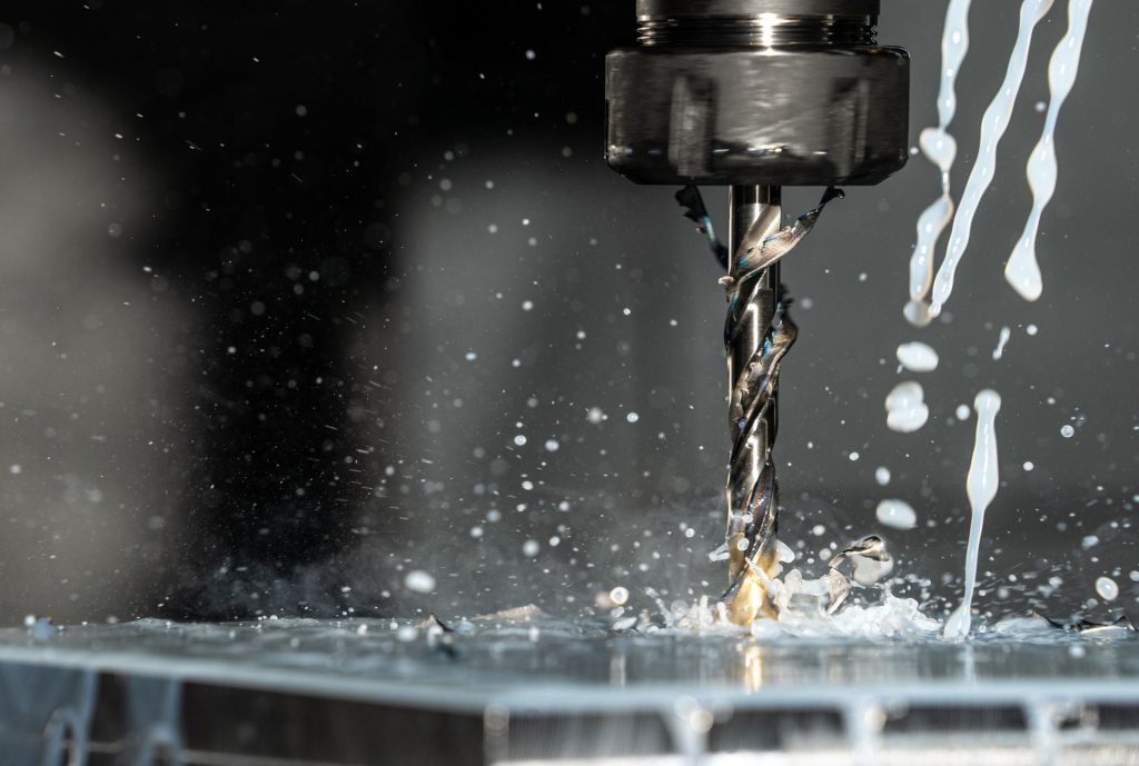 CNC drill with cutting fluid
