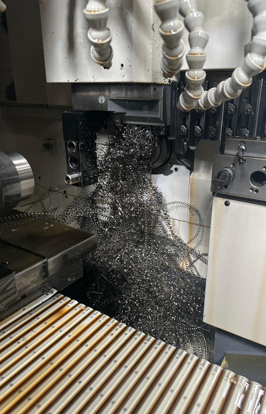 Swiss CNC sliding headstock machining process