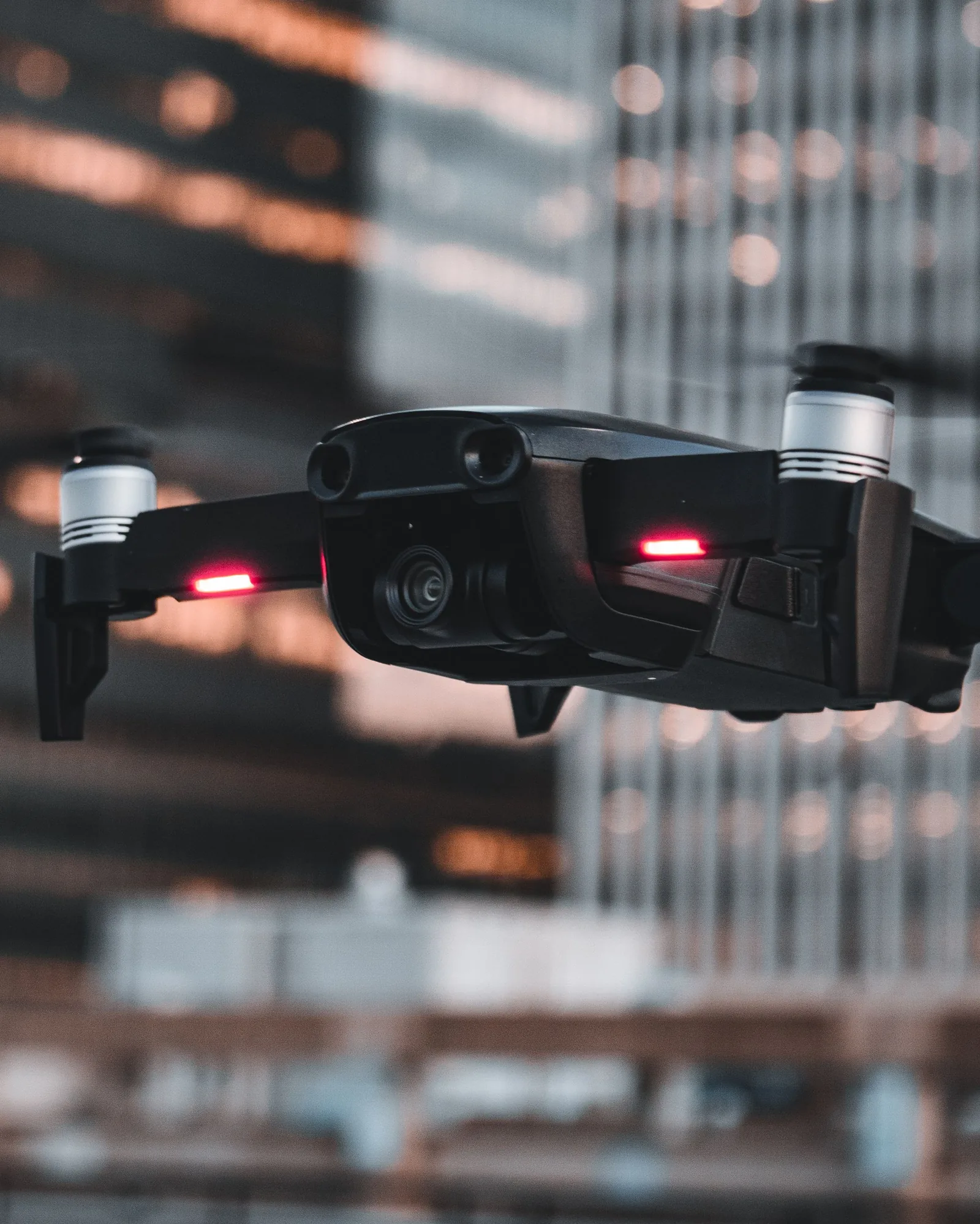 Industrial multirotor drone operating above an urban environment